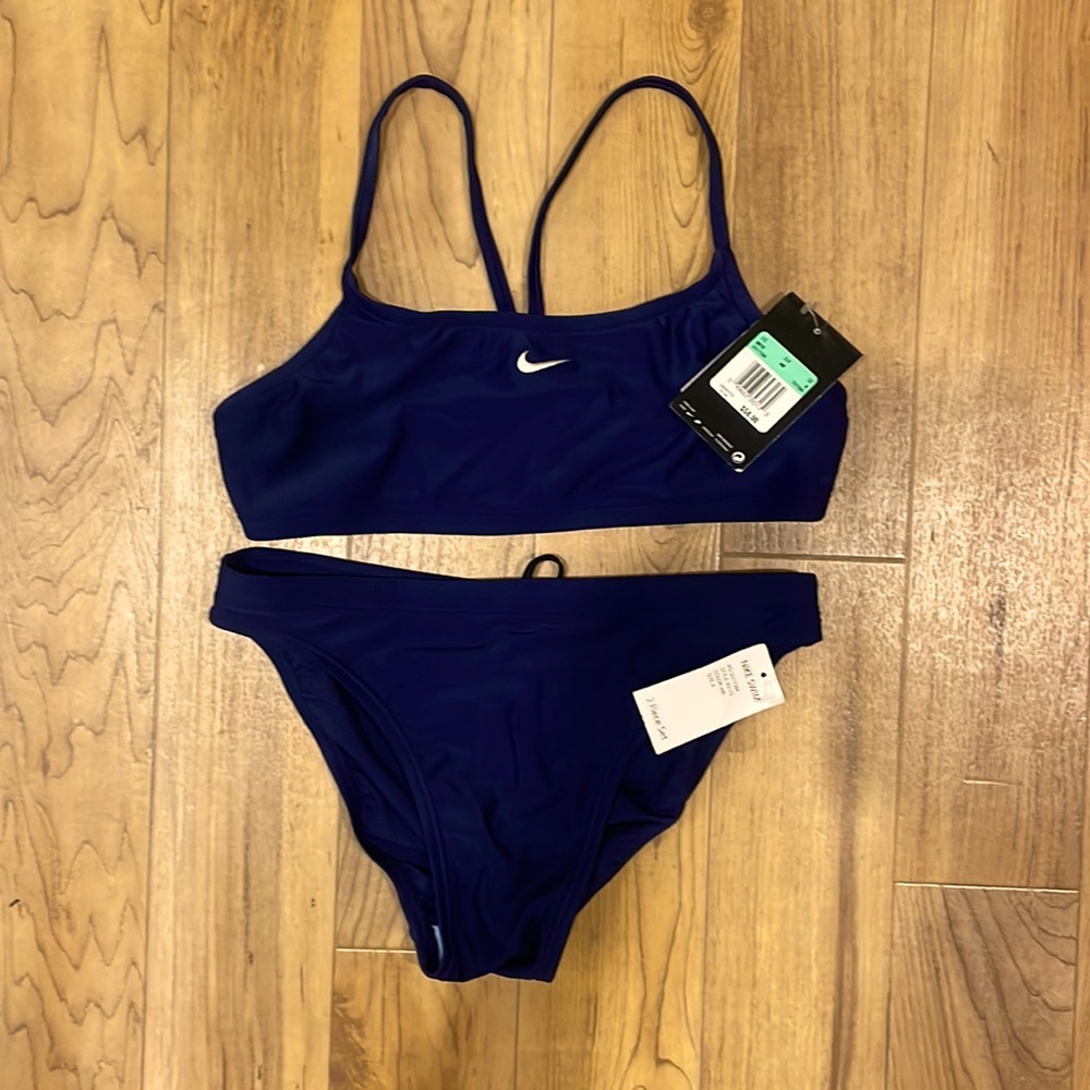 Nike Women’s 2-piece bathing suit.  Size 8.